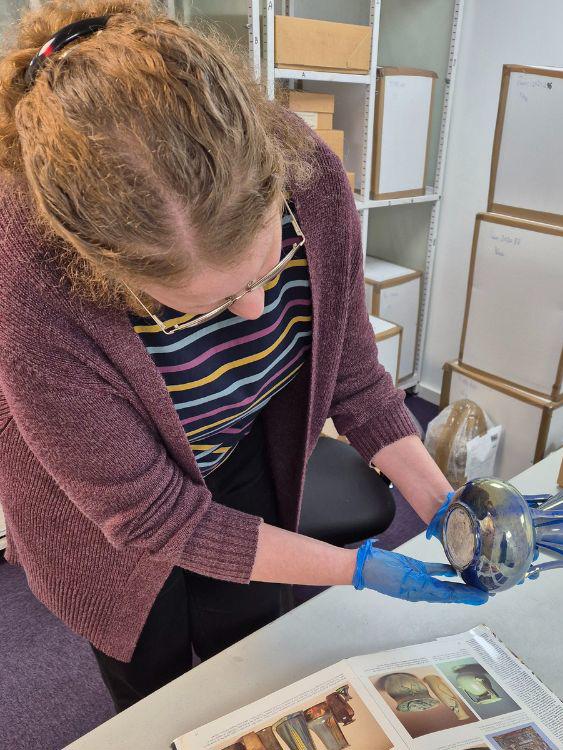 Liz examining items from the Poole Pottery collection1