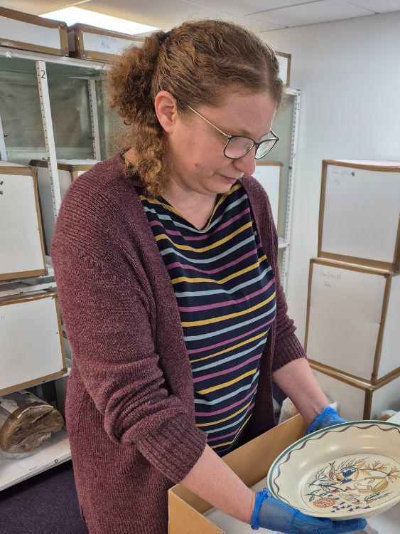 Liz examining items from the Poole Pottery collection2